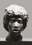 Figurative cast stone sculpture.